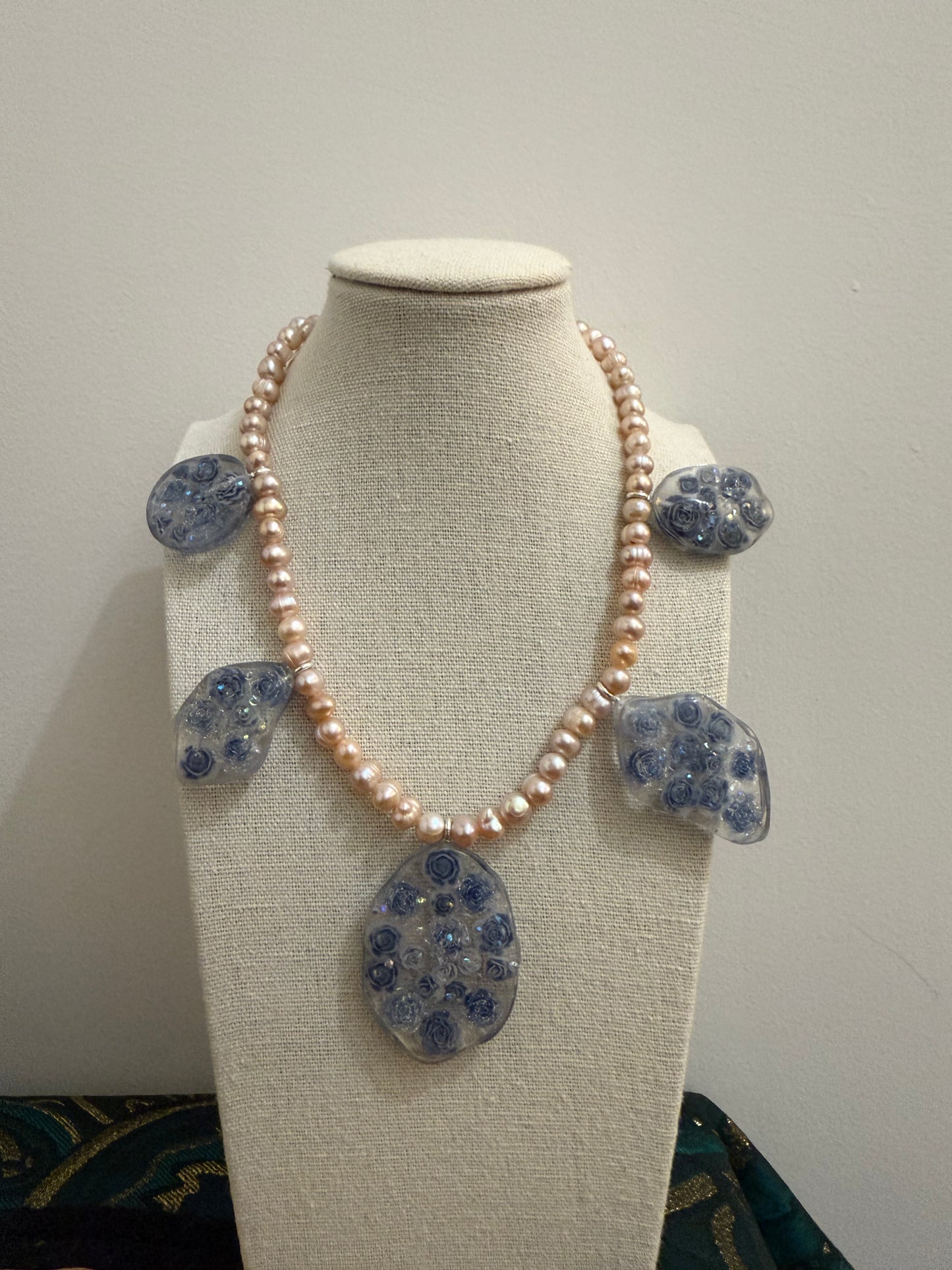 Fresh water pink pearls with baby blue roses set resin